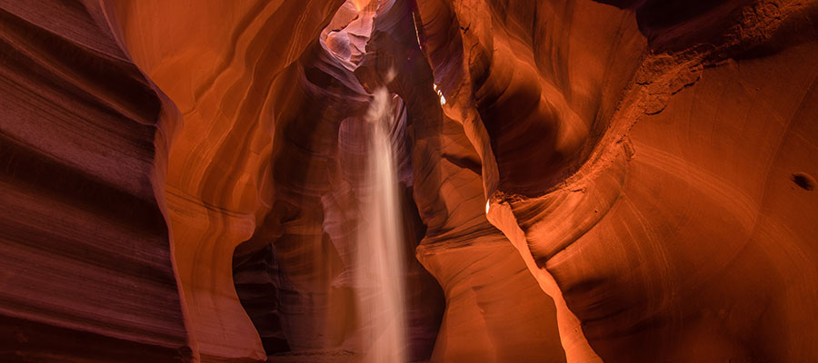 A shaft of light illuminating the sandstone inside Antelope Canyon